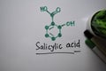 Salicylic acid molecule write on the white board. Structural chemical formula. Education concept