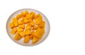 fresh papaya fruit slices on a round plate on a white background Royalty Free Stock Photo