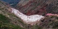 Salinas de Maras is located along the slopes of Qaqawinay mountain Royalty Free Stock Photo