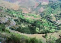 Salinas de Maras is located along the slopes of Qaqawinay mountain Royalty Free Stock Photo