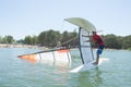 Salior trying to right catamaran after capsize