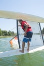 Salior trying to right catamaran after capsize