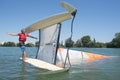 Salior trying to right catamaran after capsize