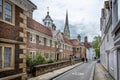 Salisbury Cathedral spire with 17th century alms houses in foreground taken in the High Street, Salisbury, Wiltshire, UK Royalty Free Stock Photo