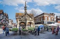 Salisbury Saturday Market stalls around historic Poultry Cross in Salisbury, Wiltshire, UK