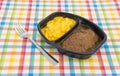 Salisbury steak meal with macaroni and cheese TV dinner