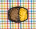 Salisbury steak meal with macaroni and cheese TV dinner