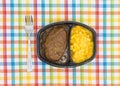 Salisbury steak meal with macaroni and cheese TV dinner