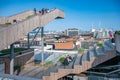 Salling ROOFTOP Roof Garden at Aarhus, Denmark with tourists sitting on a staircase, wide angle shot