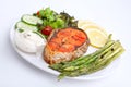 Salmon with asparagus, lemon and sauce Royalty Free Stock Photo