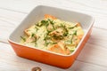 Salmon baked with cheese sauce and leek.
