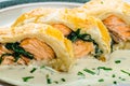 Salmon baked in puff pastry