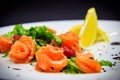 Salted salmon with garnish on black background