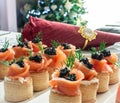 Salmon and black caviar canapÃÂ©s on plate Royalty Free Stock Photo