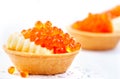 Salmon caviar. Tartlets with red caviar. Gourmet food. Seafood. Trout caviar