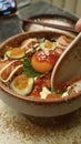 Salmon Chirashi Don, A traditional Japanese cuisine consists of a rice bowl with raw salmon, salmon roe, egg yolk, and cucumber Royalty Free Stock Photo