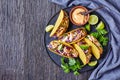 Salmon corn tacos on a black plate Royalty Free Stock Photo