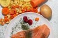 salmon dish with potatoes and carrots Royalty Free Stock Photo