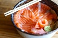 Salmon Donburi serve with miso soup on wooden table Royalty Free Stock Photo