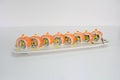 Salmon ebi filled avocado, tamago, kani, cucumber pickle sushi roll with mayonnaise sauce