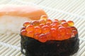 Salmon egg on sushi nigiri roll Royalty Free Stock Photo