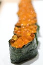 Salmon egg on sushi nigiri roll, Japanese food Royalty Free Stock Photo