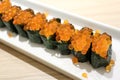 Salmon egg on sushi nigiri roll, Japanese food Royalty Free Stock Photo