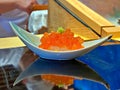 Close up shot to Omakase salmon egg sushi Royalty Free Stock Photo