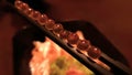 Salmon eggs were putted orderly on the chopsticks Royalty Free Stock Photo