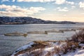 Salmon farm in norwegian fjord, sunny winter landscape, panoramic view, Lofoten Islands, Norway Royalty Free Stock Photo