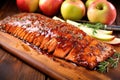 salmon fillet brushed with glistening apple cider bbq glaze, pre-grill