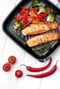 Salmon fillet on grill pan ready to cook Royalty Free Stock Photo