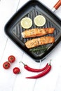 Salmon fillet on grill pan ready to cook Royalty Free Stock Photo