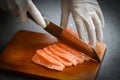 salmon fillet on wooden cutting board, fresh raw salmon fish fillet with kitchen knife for cooking food seafood salmon fish Royalty Free Stock Photo