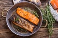 Salmon fillets. Grilled salmon, sesame seeds herb decorationon on vintage pan or black slate board. Royalty Free Stock Photo