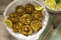 Salmon fish cakes with lemon Royalty Free Stock Photo