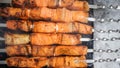 Salmon fish kebab on skewers on the grill in winter Royalty Free Stock Photo