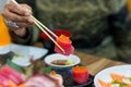 Salmon maki roll Japanese food restaurant, salmon sushi on plate. Sushi platter with a mixed variety of the Japanese delicacy at Royalty Free Stock Photo