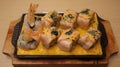 Salmon Melted Cheese Roll is a set of sushi consist of salmon, fried prawn, cucumber with spicy mayo and melted cheese sauce