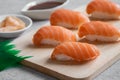 Salmon nigiri sushi on wooden plate, Japanese food Royalty Free Stock Photo