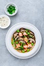 Salmon Noodle Soup with shiitake mushrooms, edamame beans and green onion Royalty Free Stock Photo