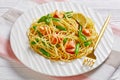 Salmon pasta with green beans on a white plate Royalty Free Stock Photo