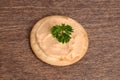 Salmon pate cracker on wood