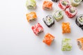 Top view on set of sushi rolls,maki on white background copy space