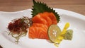 Salmon raw fillet fish sliced japanese sashimi alacarte foods menu on white dish Royalty Free Stock Photo
