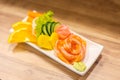 Salmon raw sashimi On a white plate in a restaurant,food japanese Royalty Free Stock Photo