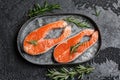 Salmon. Raw trout red fish steak with ingredients for cooking. Cooking Salmon, sea food. Healthy eating concept Royalty Free Stock Photo