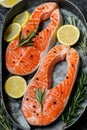 Salmon. Raw trout red fish steak with ingredients for cooking. Cooking Salmon, sea food. Healthy eating concept Royalty Free Stock Photo