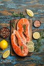 Salmon. Raw trout red fish steak with ingredients for cooking. Cooking Salmon, sea food. Healthy eating concept Royalty Free Stock Photo