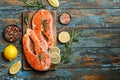 Salmon. Raw trout red fish steak with ingredients for cooking. Cooking Salmon, sea food. Healthy eating concept Royalty Free Stock Photo